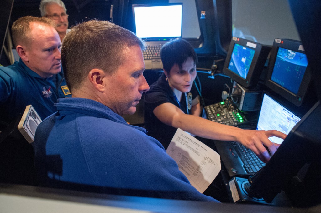 Expedition 42/43 crew members Samantha Cristoforetti, Barry Wilmore, Terry Virts during FF T&C/R Mini Sim 1 in the SES Alpha Cupola trainer. Credit: Lauren Harnett